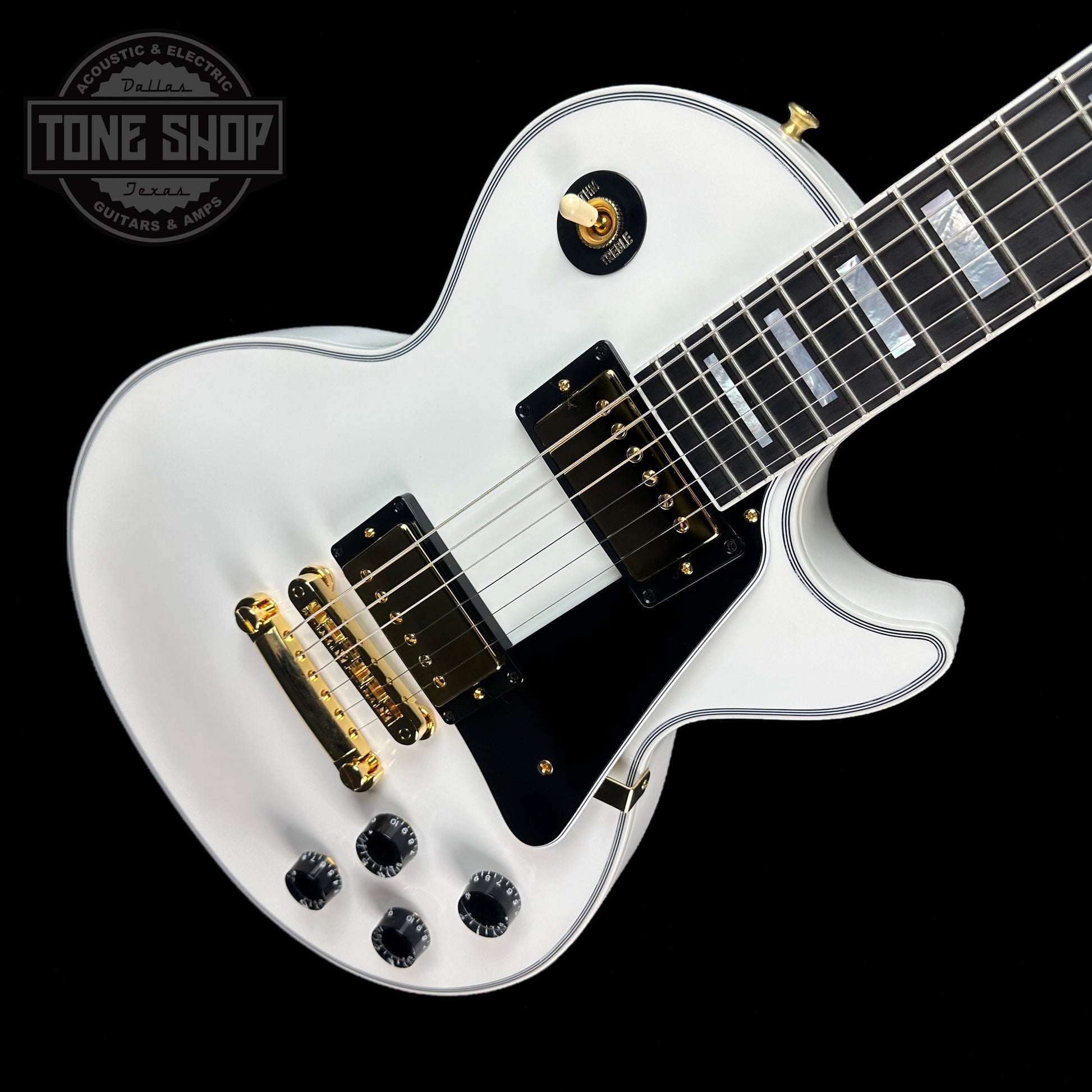 Front angle of Gibson Custom Shop Les Paul Custom Alpine White w/ Ebony Fingerboard Gloss.