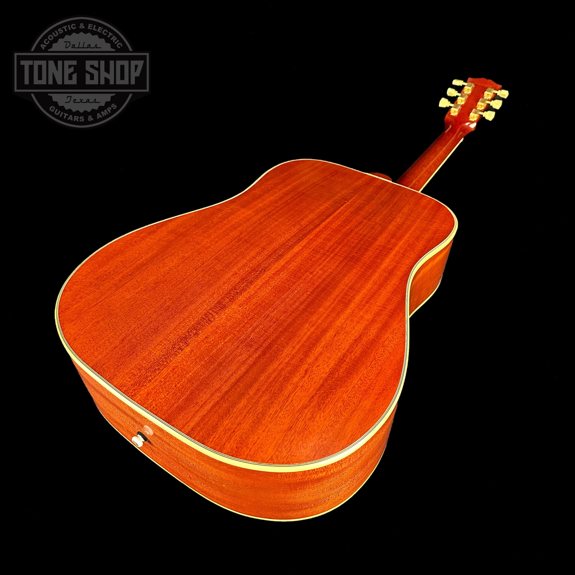 Back angle of Gibson Acoustic 1960 Hummingbird Murphy Lab Light Aged Heritage Cherry Sunburst.