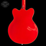 Red electric guitar body on a black background with 'Tone Shop' logo.