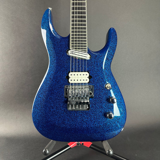Front of Used Jackson LTD Wildwood Series Soloist Arch Top Extreme SL27 EX Blue Sparkle.