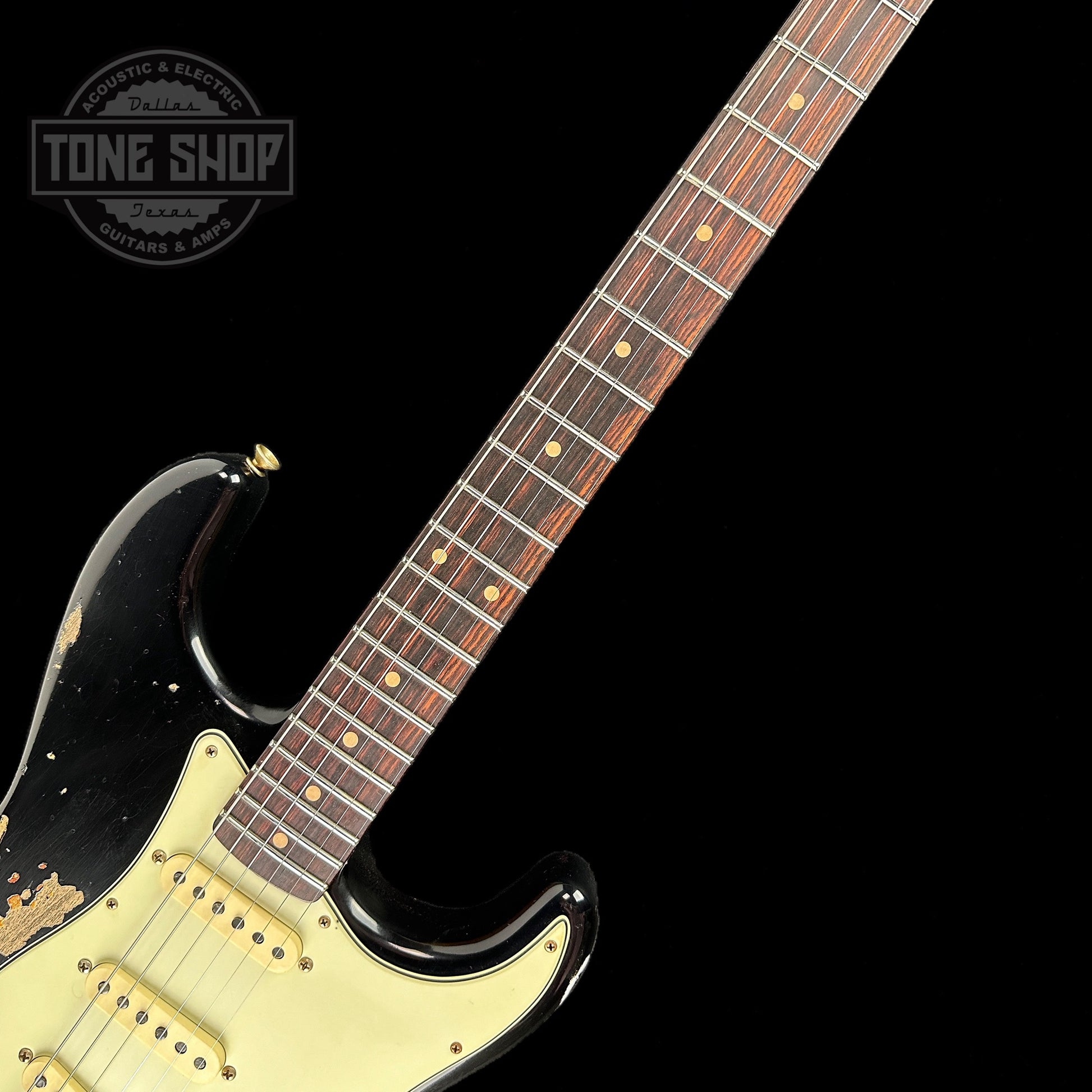 Fretboard of Fender Custom Shop 2023 Collection 60 Strat Heavy Relic Aged Black Over 3 Color Sunburst.