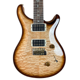 Electric guitar with a sunburst finish on a white background