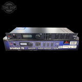 Audio processing device with 'dbx' branding on a black background