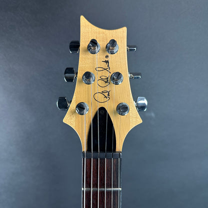 Front of headstock of Used PRS CE22 Trans Blue.