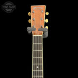Martin Custom Shop 00L-14 All-Mahogany Guitar headstock with a strap lock on a black background, featuring the Tone Shop logo.