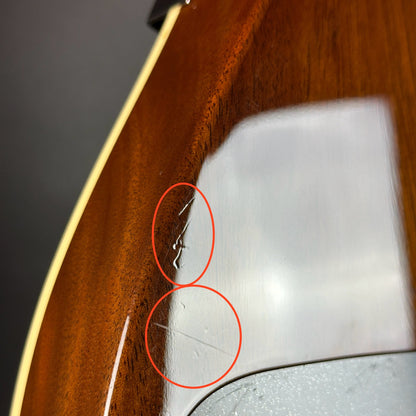 Scratches on back of Used Gretsch G6128T-53 Duo Jet Black.