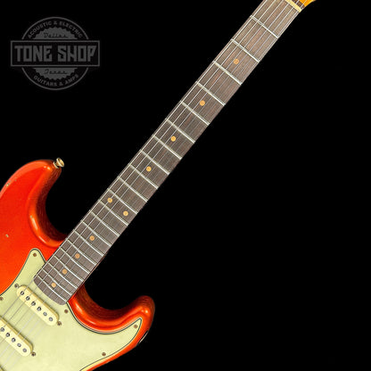 Fretboard of Fender Custom Shop Limited Edition 62 Strat Heavy Relic Aged Candy Tangerine Over 3 Color Sunburst.