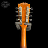 Back of headstock of Vintage 1964 Gibson A40 Mandolin.
