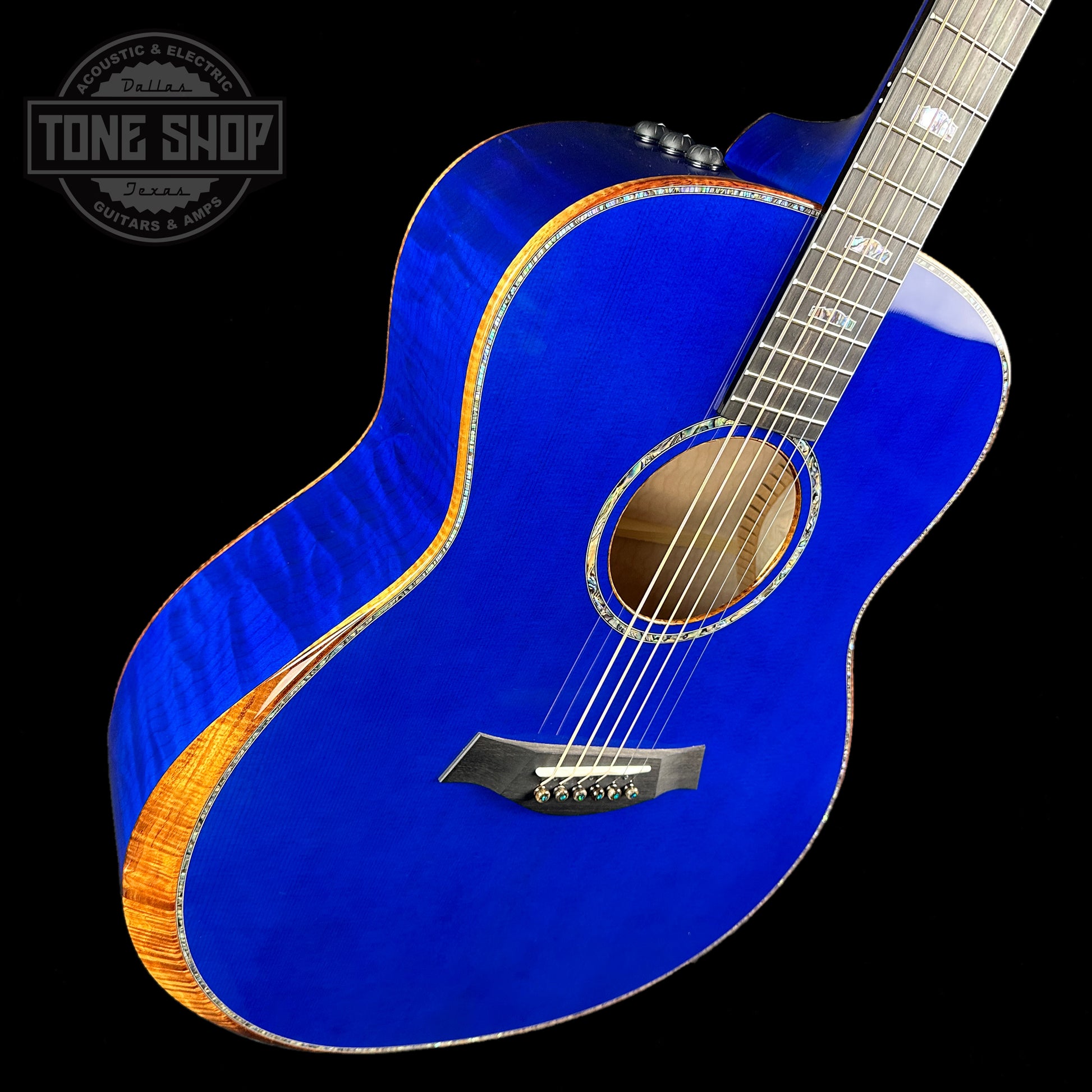 Front angle of Taylor Custom #3: C18e Grand Orchestra Lutz Spruce/Quilted Maple Royal Blue.