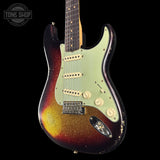 Vintage electric guitar with a sunburst finish on a black background, featuring the Tone Shop logo.