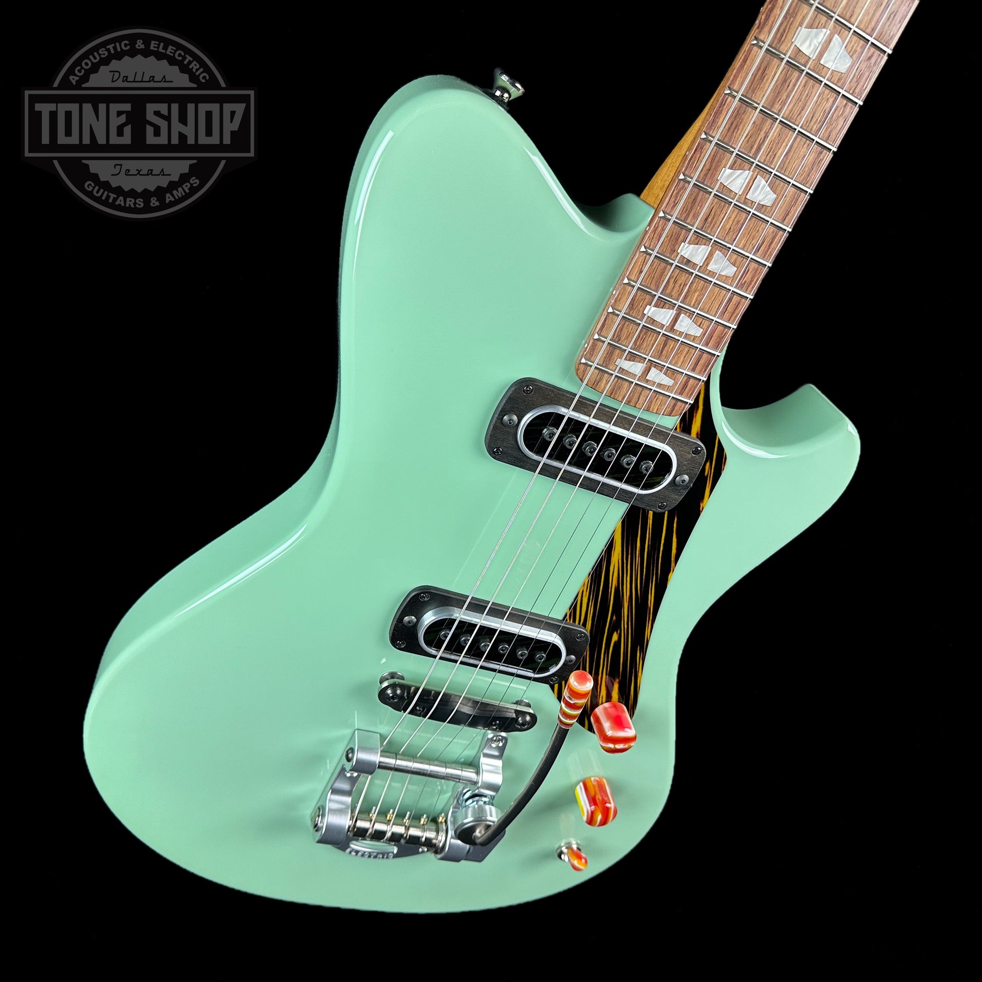 Front angle of Powers Electric A-Type Fern Green PF42 Firestripe Delrin Warm CamTail.