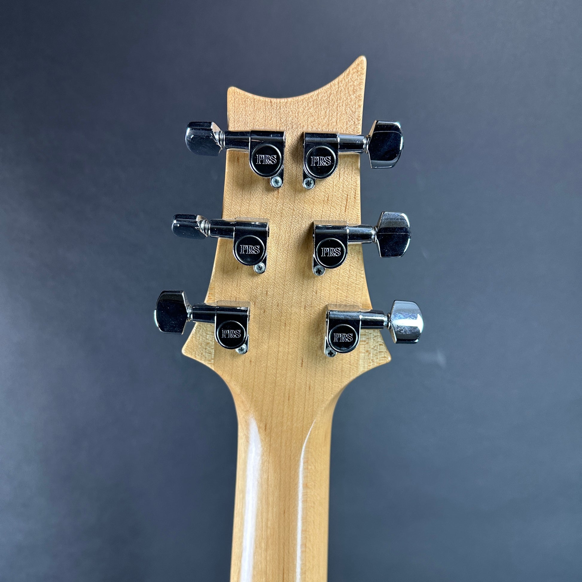 Back of headstock of Used PRS CE22 Trans Blue.