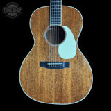 Martin Custom Shop 00L-14 All-Mahogany guitar with a light wood finish on a black background, featuring the Tone Shop logo.