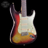 Vintage electric guitar with a sunburst finish on a black background, featuring the Tone Shop logo.