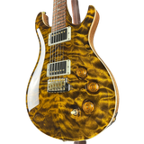 Electric guitar with a tortoiseshell finish on a white background