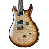 Electric guitar with a sunburst finish on a white background