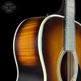 Front detail of Martin Custom Shop 28 Style OM Adirondack/Pacific Big Leaf Flamed Maple Ambertone.