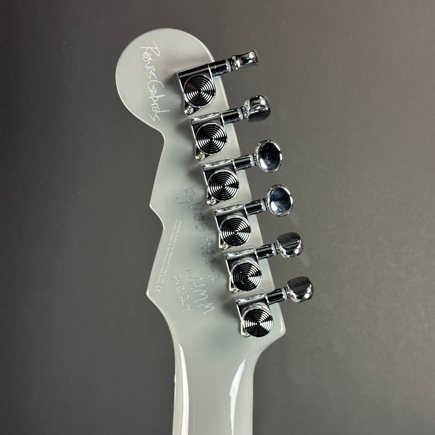 Back of headstock of Namm Demo Reverend Reeves Gabrels Dirtbike Royale Feline Gray.