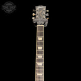 Headstock of Used 2025 Gibson Les Paul Studio Session Trans Ebony Burst.