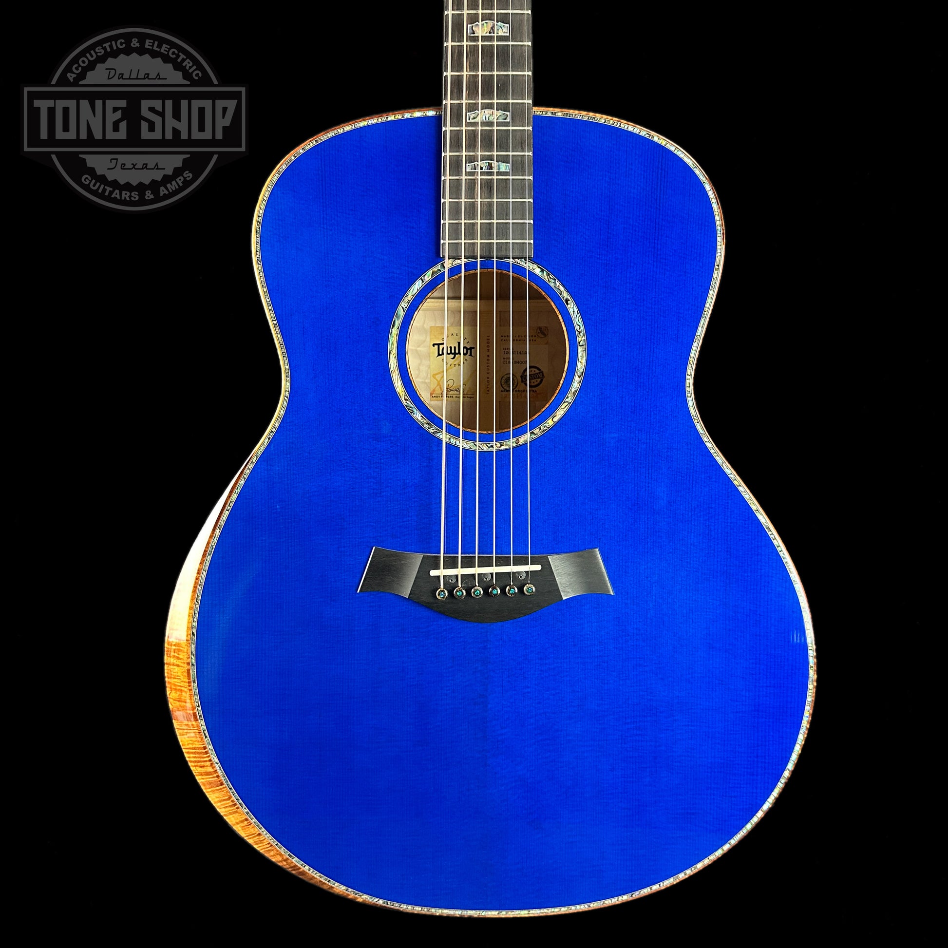 Front of body of Taylor Custom #3: C18e Grand Orchestra Lutz Spruce/Quilted Maple Royal Blue.