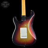 Electric guitar with a sunburst finish on a black background, featuring the Tone Shop logo.