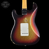 Glossy electric guitar with a sunburst finish on a black background, featuring 'Tone Shop' branding.