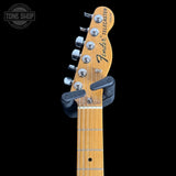 Fender Telecaster guitar neck with headstock on a black background