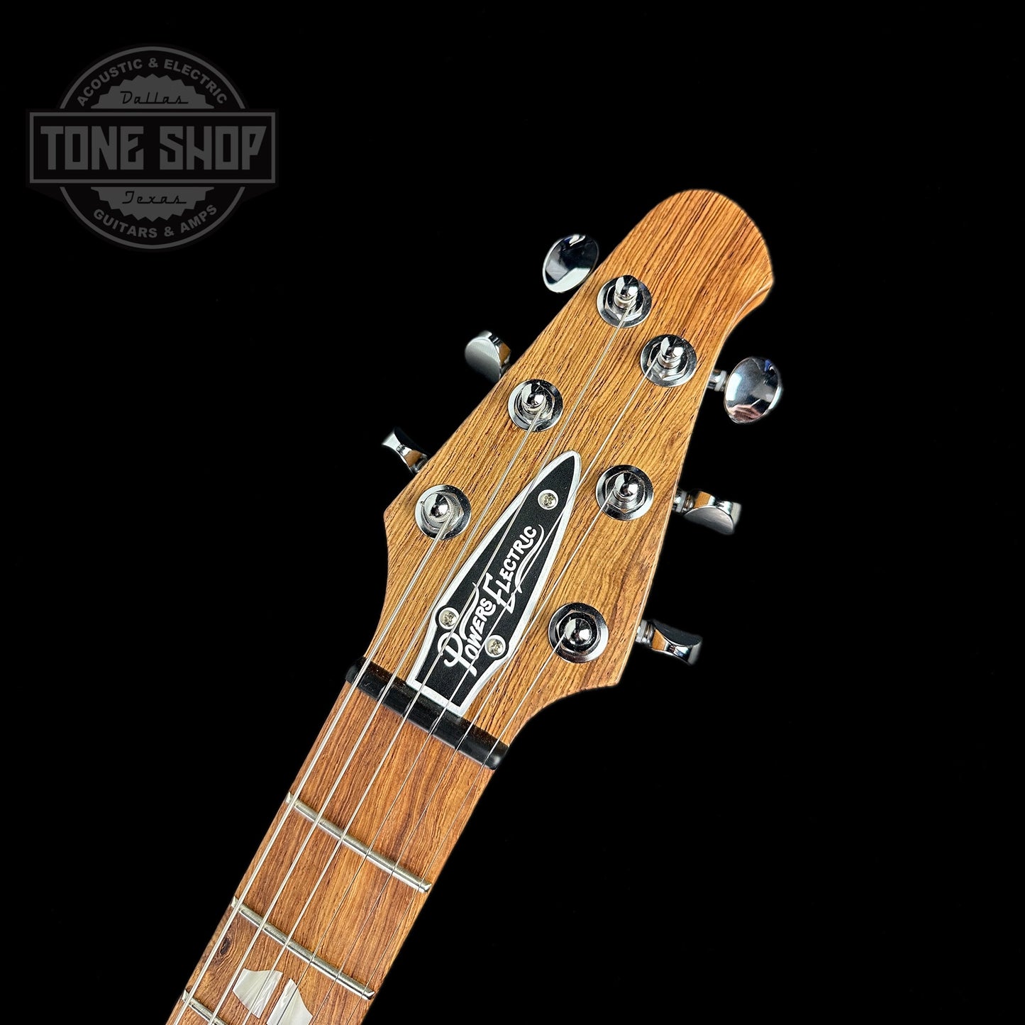 Front of headstock of Powers Electric A-Type Select Cabernet Red FF42 Firestripe.
