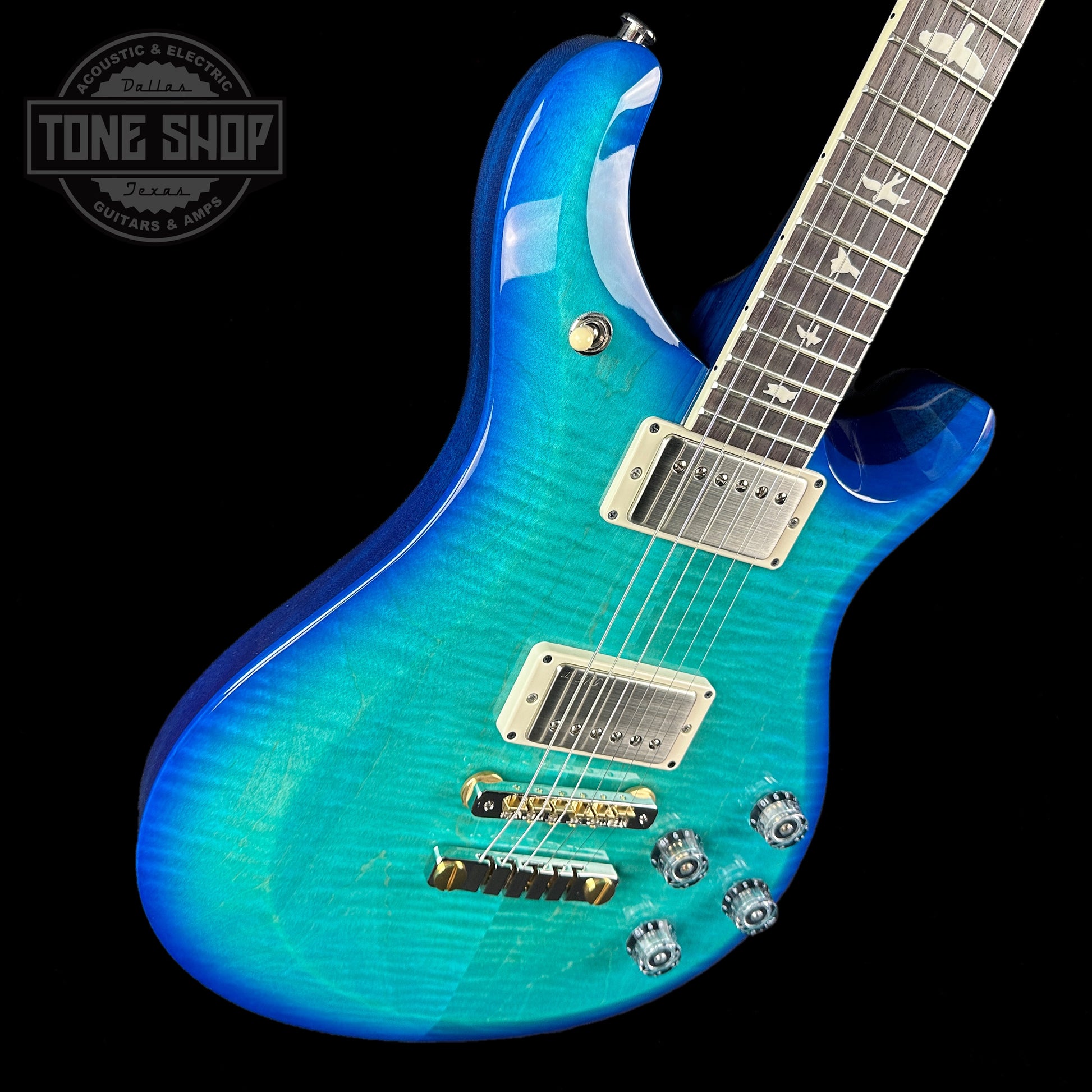 Front angle of PRS S2 McCarty 594 Flame Top Makena Blue.