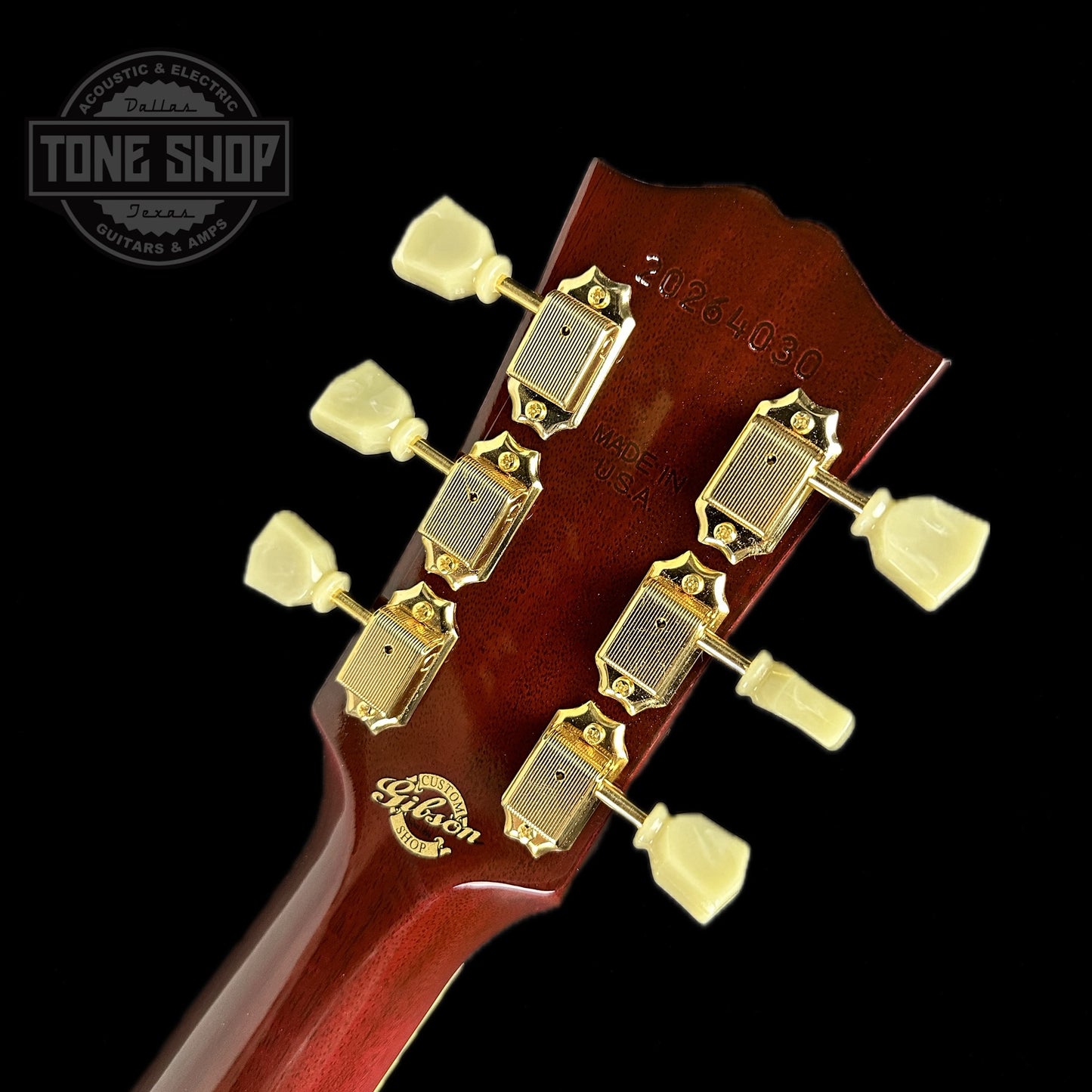 Back of headstock of Gibson Custom Shop M2M Hummingbird Original Wine Red.