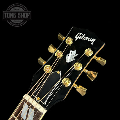 Front of headstock of Gibson Custom Shop M2M All Koa Hummingbird Gold Hardware Grover Tulips.