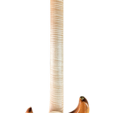 Close-up of a guitar neck with a white background