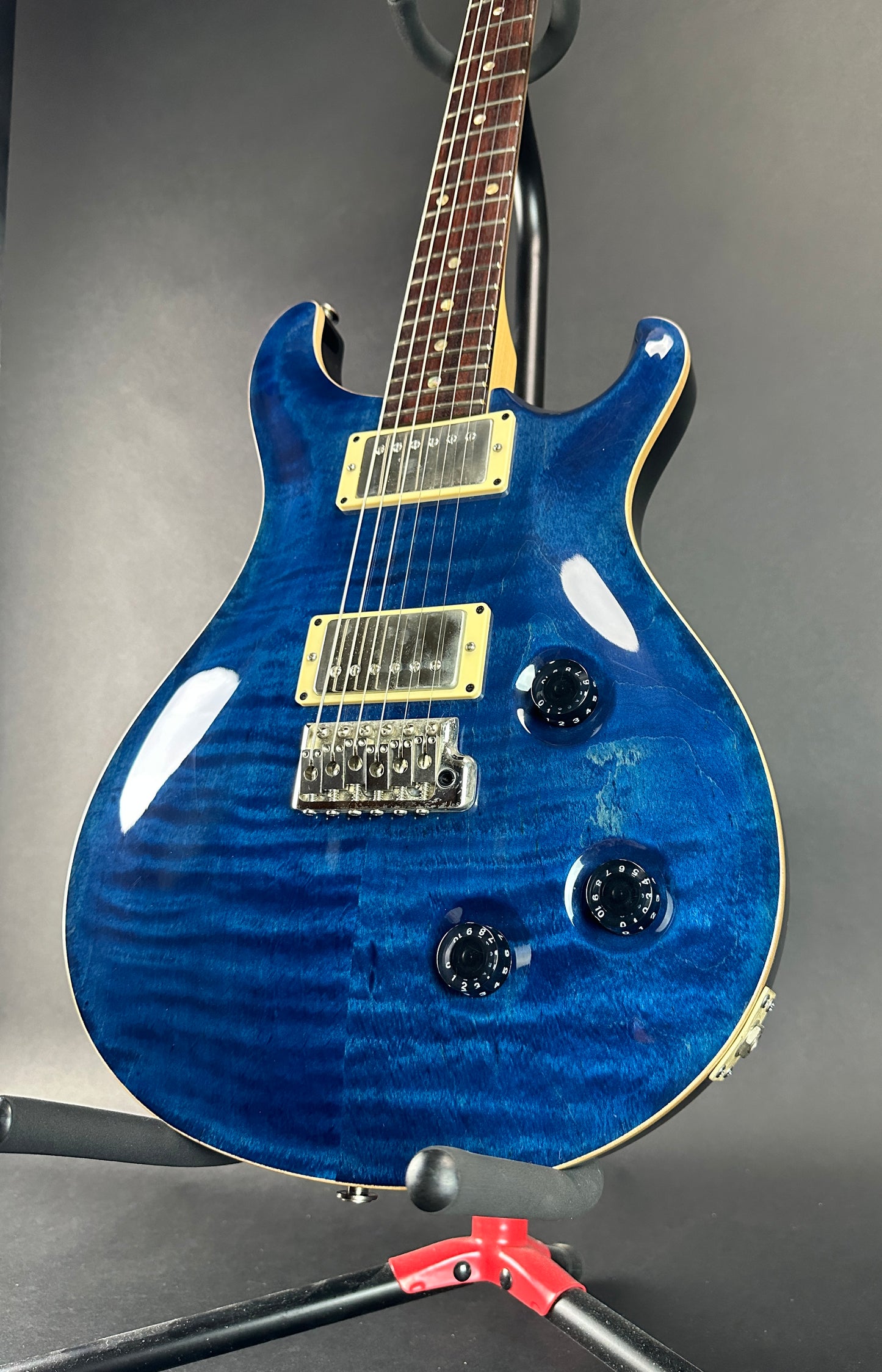 Front angle of Used PRS CE22 Trans Blue.