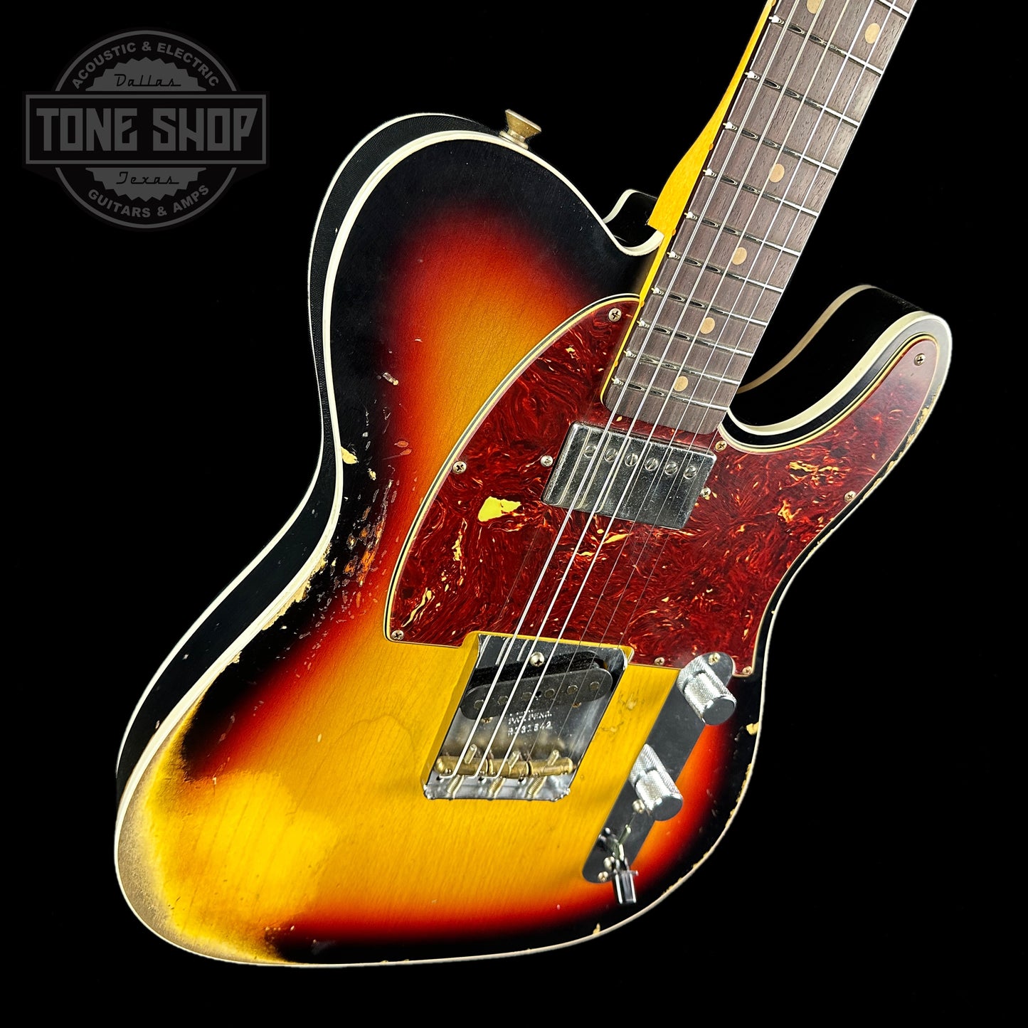 Front angle of Fender Custom Shop Limited Edition Reverse 60 Tele Custom Heavy Relic 3 Color Sunburst.