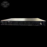 Power strip with multiple outlets on a black background, featuring the Tone Shop logo.