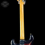 Guitar neck with a 'Tone Shop' logo in the corner