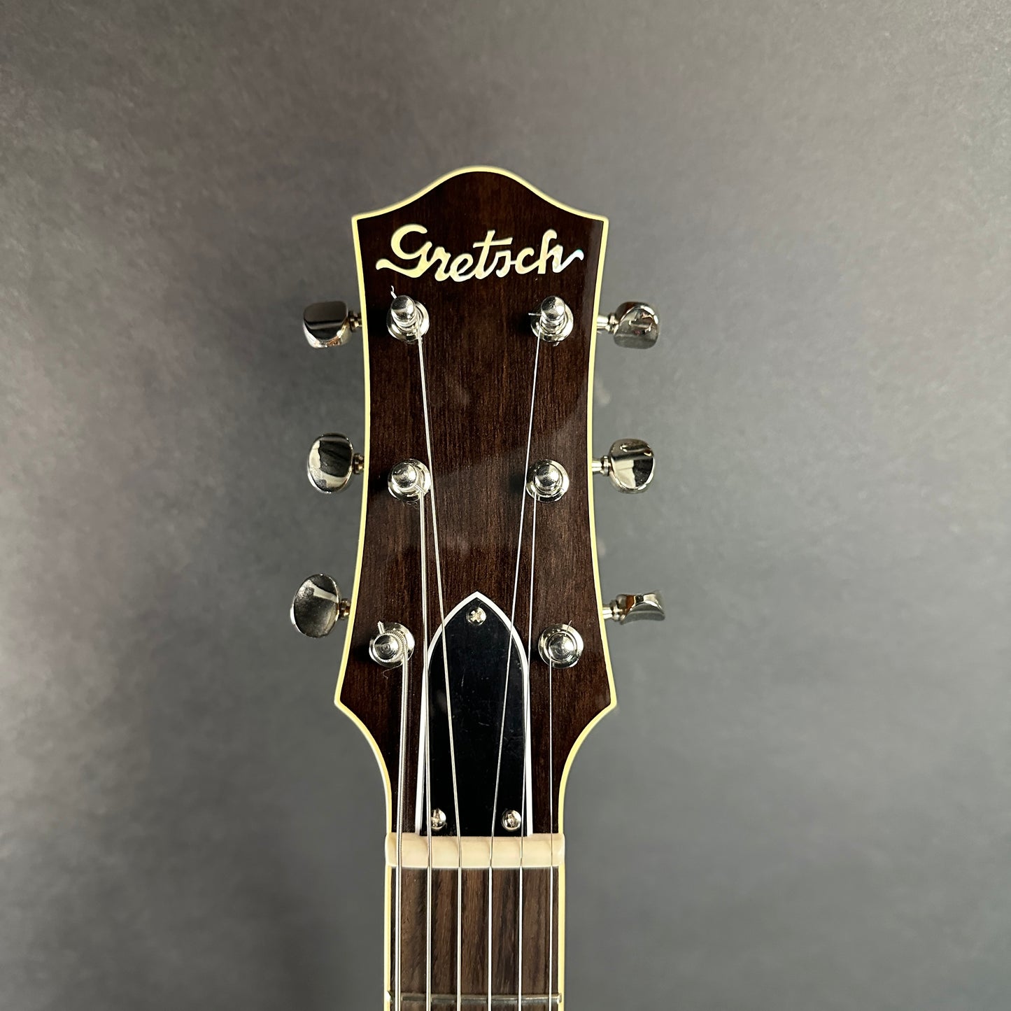 Front of headstock of Used Gretsch G6128T-53 Duo Jet Black.