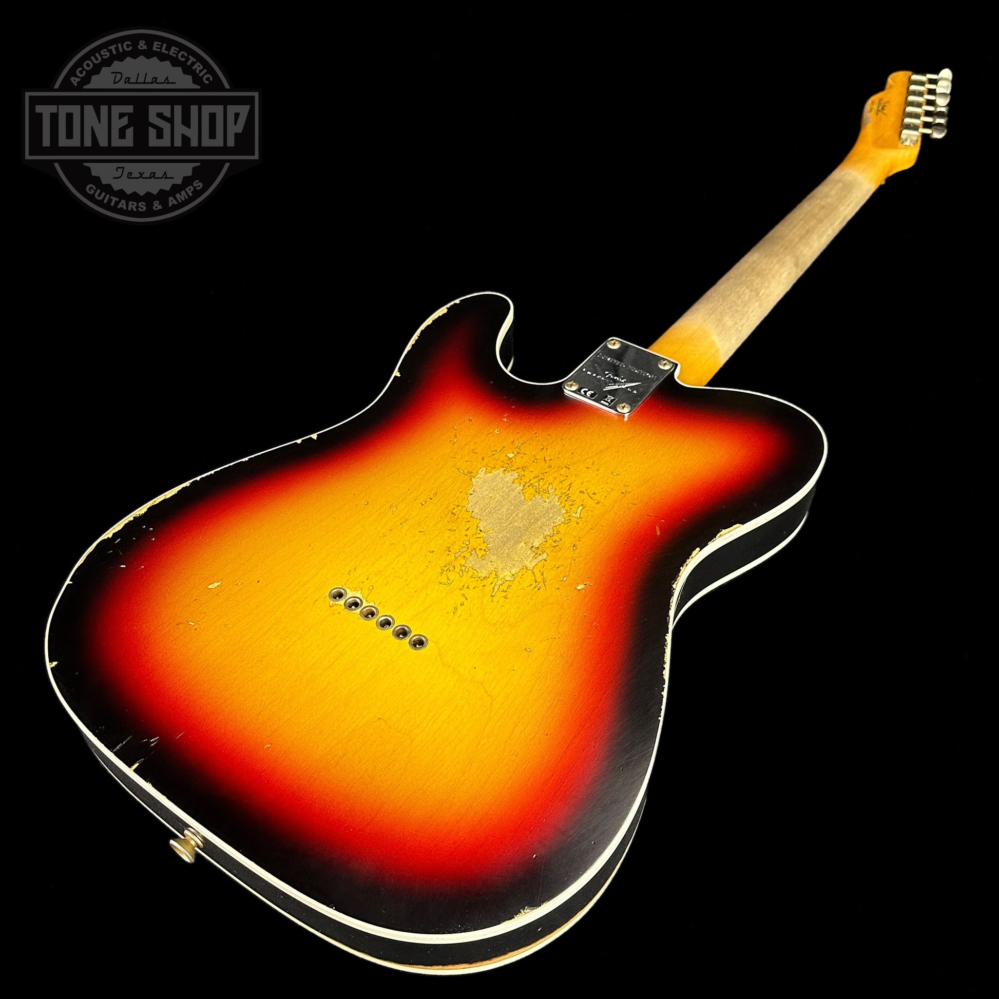 Back angle of Fender Custom Shop Limited Edition Reverse 60 Tele Custom Heavy Relic 3 Color Sunburst.