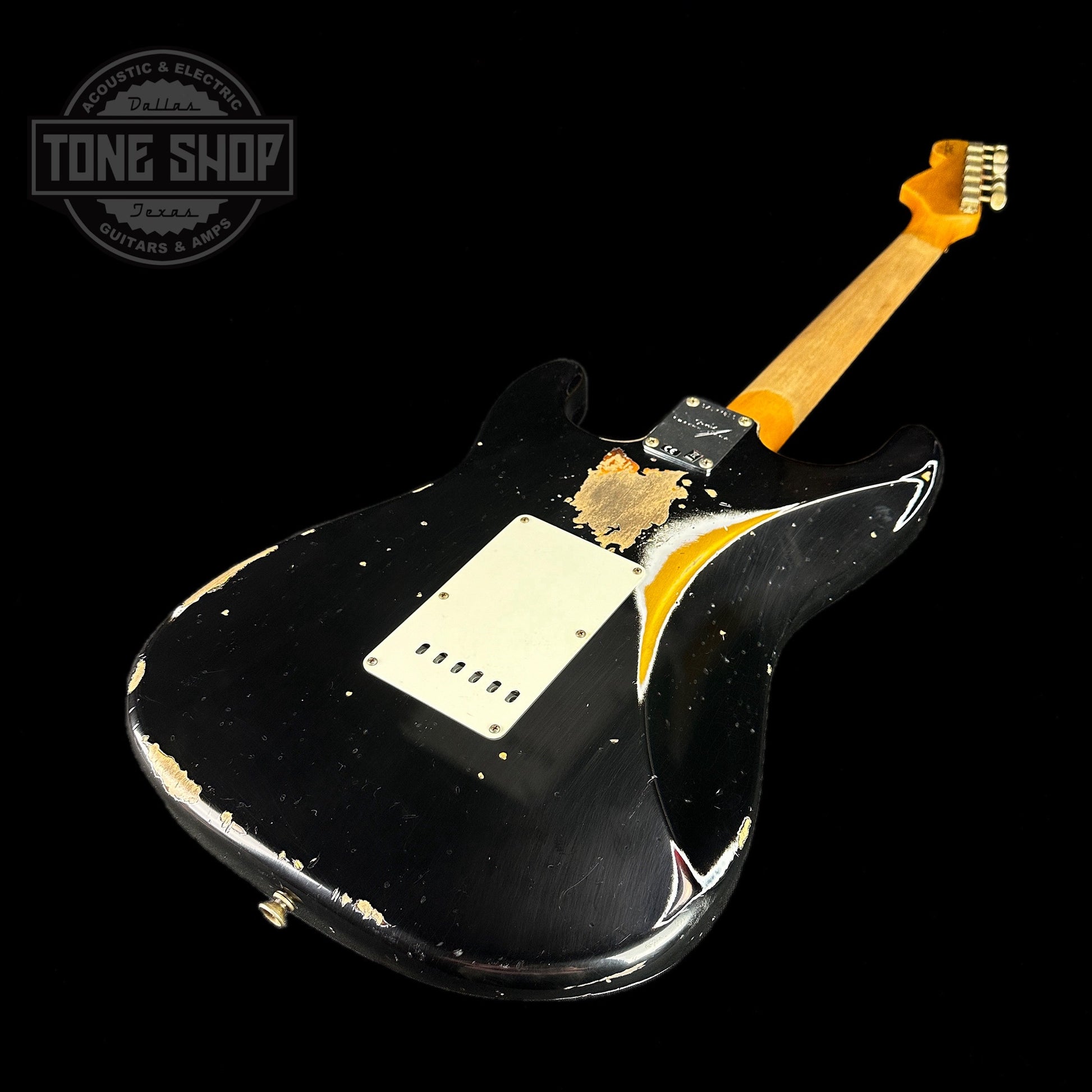 Back angle of Fender Custom Shop 2023 Collection 60 Strat Heavy Relic Aged Black Over 3 Color Sunburst.
