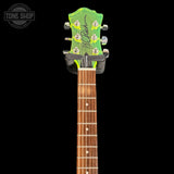 Used BC Rich Mockingbird Trans Green Acrylic headstock with brand logo on a black background