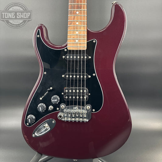 Front of Used G&L Legacy USA Fullerton Deluxe HSS Ruby Red Metallic Left Handed.