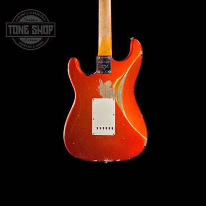 Back of body of Fender Custom Shop Limited Edition 62 Strat Heavy Relic Aged Candy Tangerine Over 3 Color Sunburst.