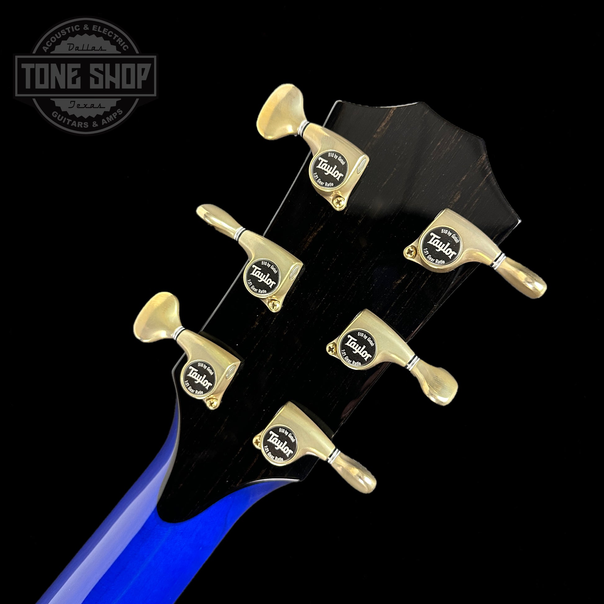 Back of headstock of Taylor Custom #3: C18e Grand Orchestra Lutz Spruce/Quilted Maple Royal Blue.