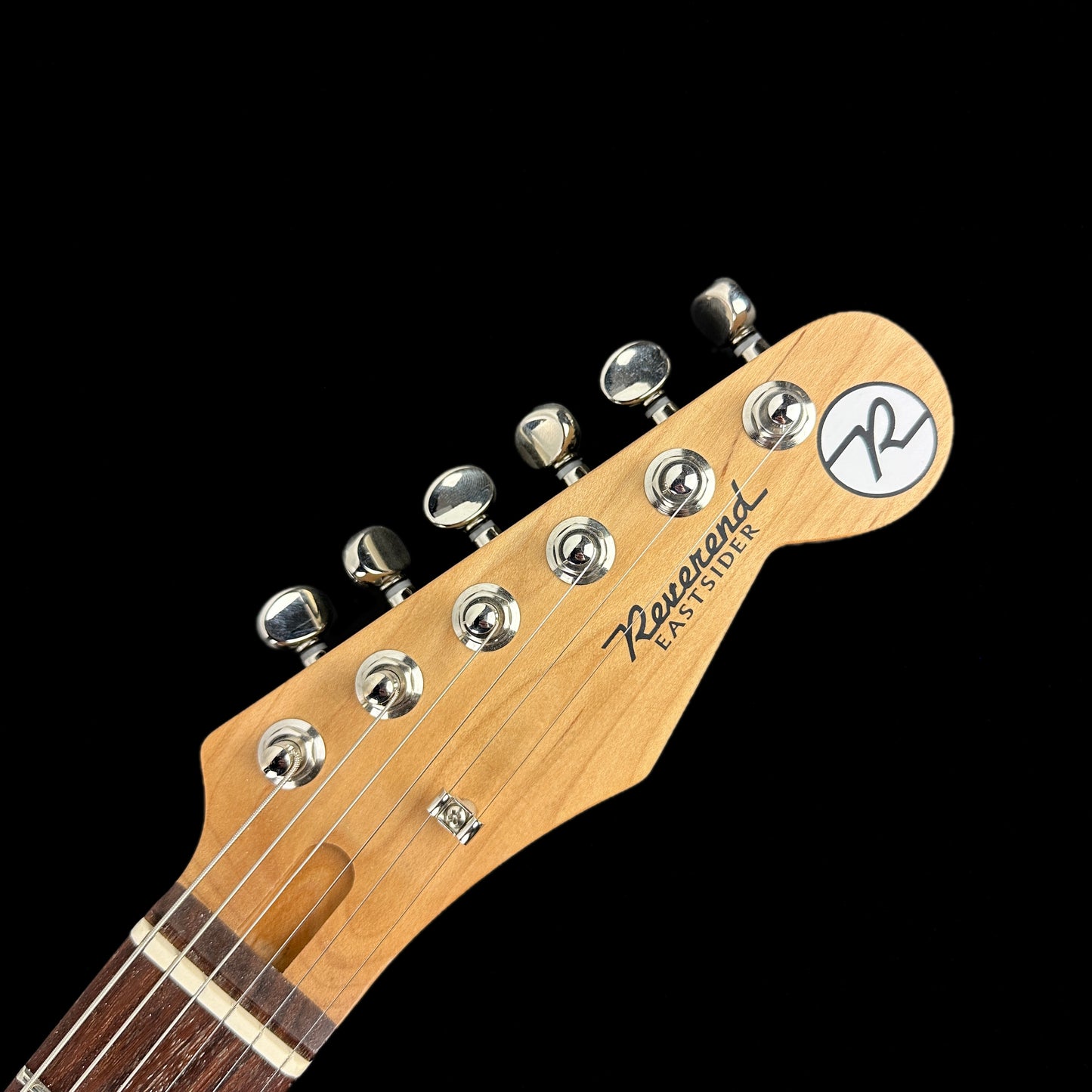 Front of headstock of Reverend Pete Anderson Eastsider T "E" Natural Satin Korina Tone Shop Exclusive.