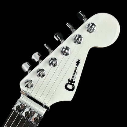Front of headstock of Charvel Custom Shop Limited Edition San Dimas Nos Snowblind.