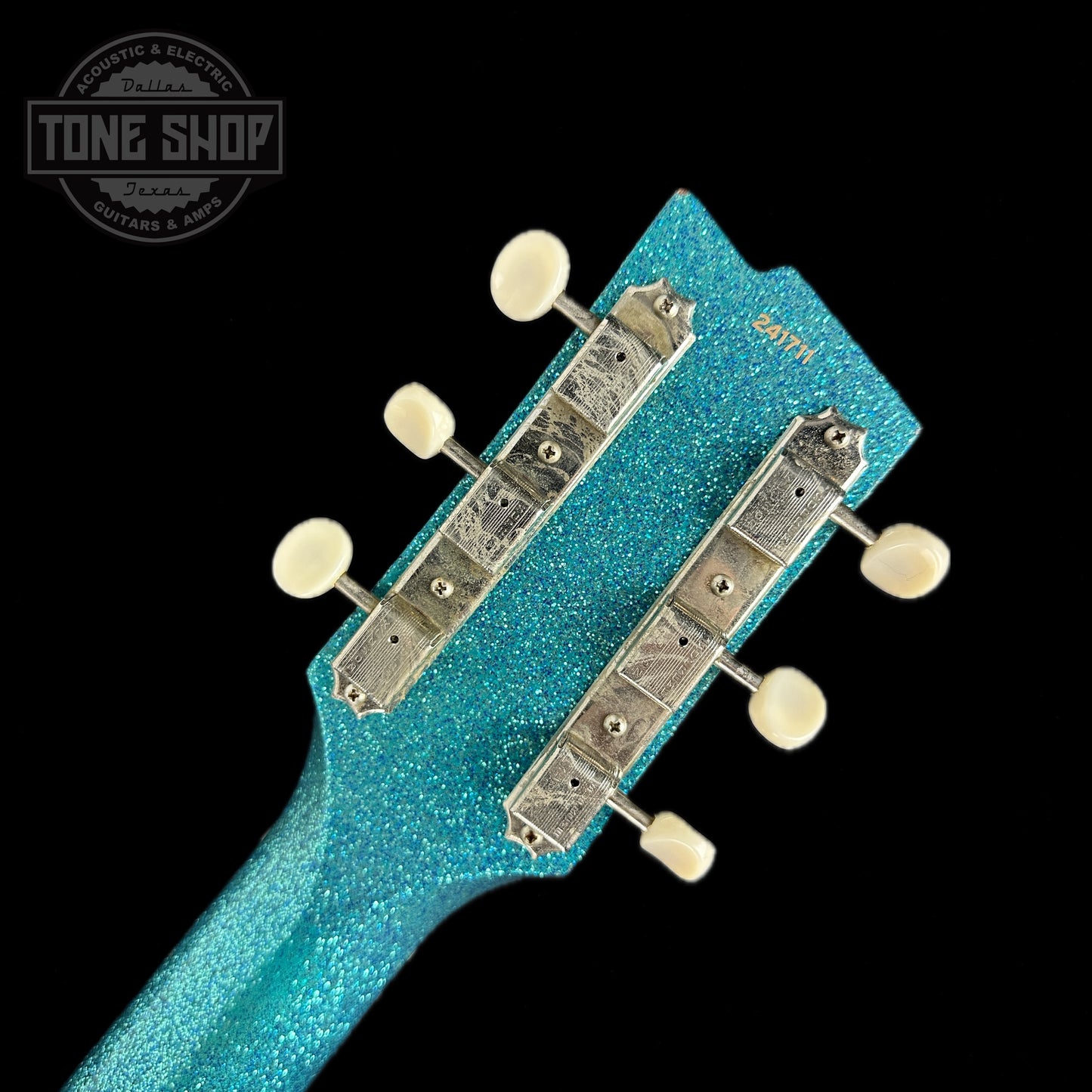 Back of headstock of Rock N Roll Relics Thunders Teal Sparkle Med Aging.