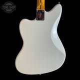 Squier Classic Vibe 60s Jazzmaster Oly White electric guitar body with a visible brand logo on a black background