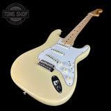 Front angle of Fender 1968 Stratocaster DLX Closet Classic Maple Neck Aged Vintage White.