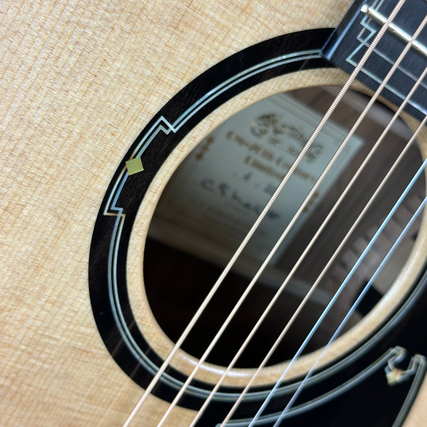 Soundhole of Martin OM 20th Century Limited.