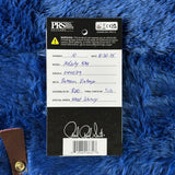 PRS guitar label on a blue textured surface